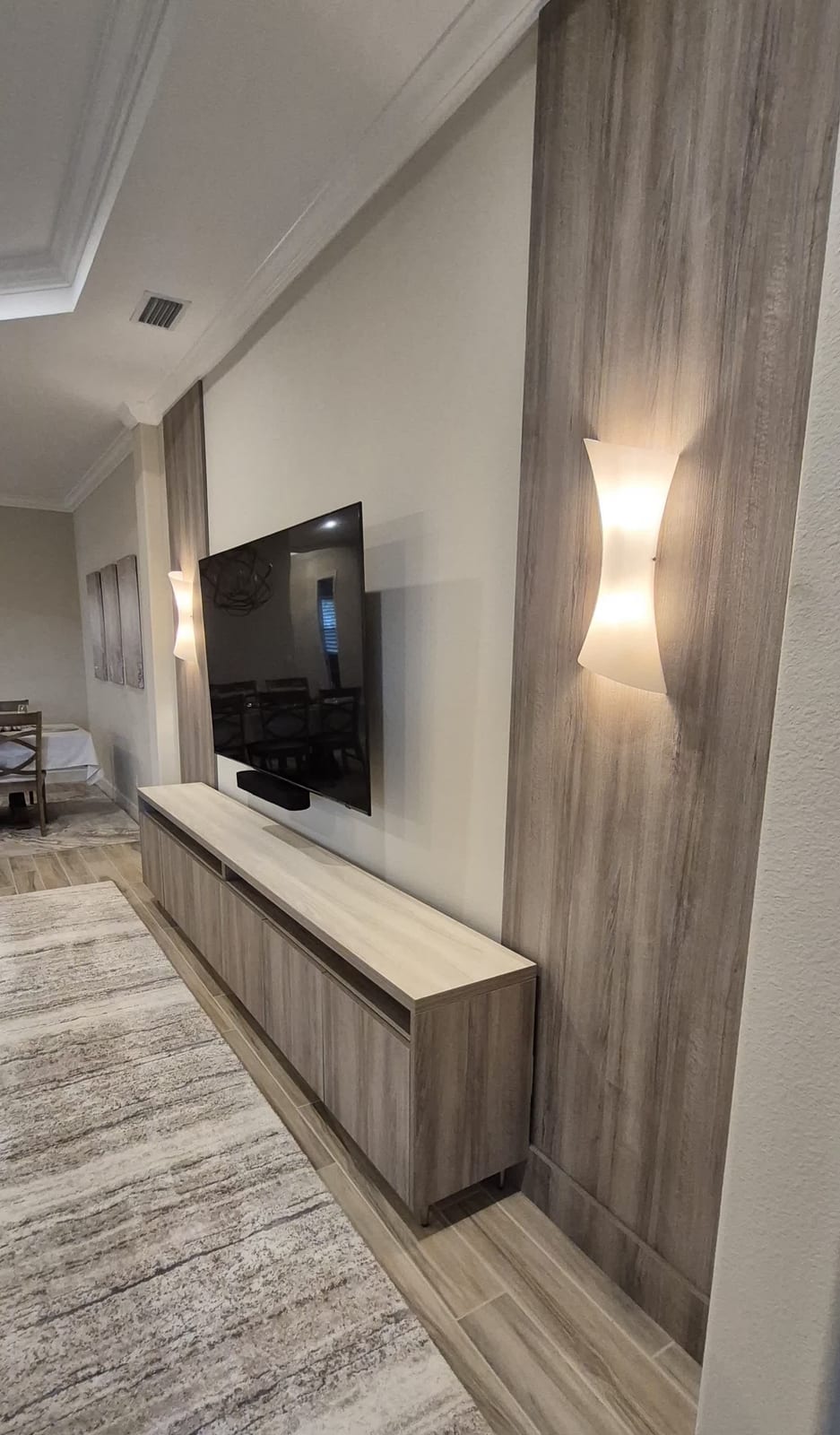 Custom built-in entertainment wall with integrated lighting